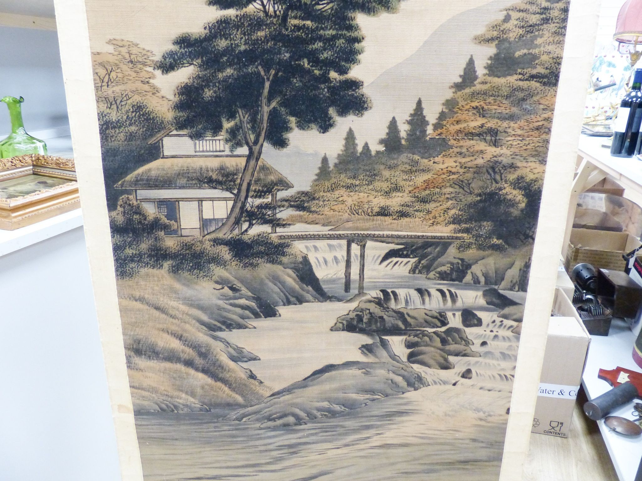 An early 20th century Japanese painted felt and watercolour landscape scroll